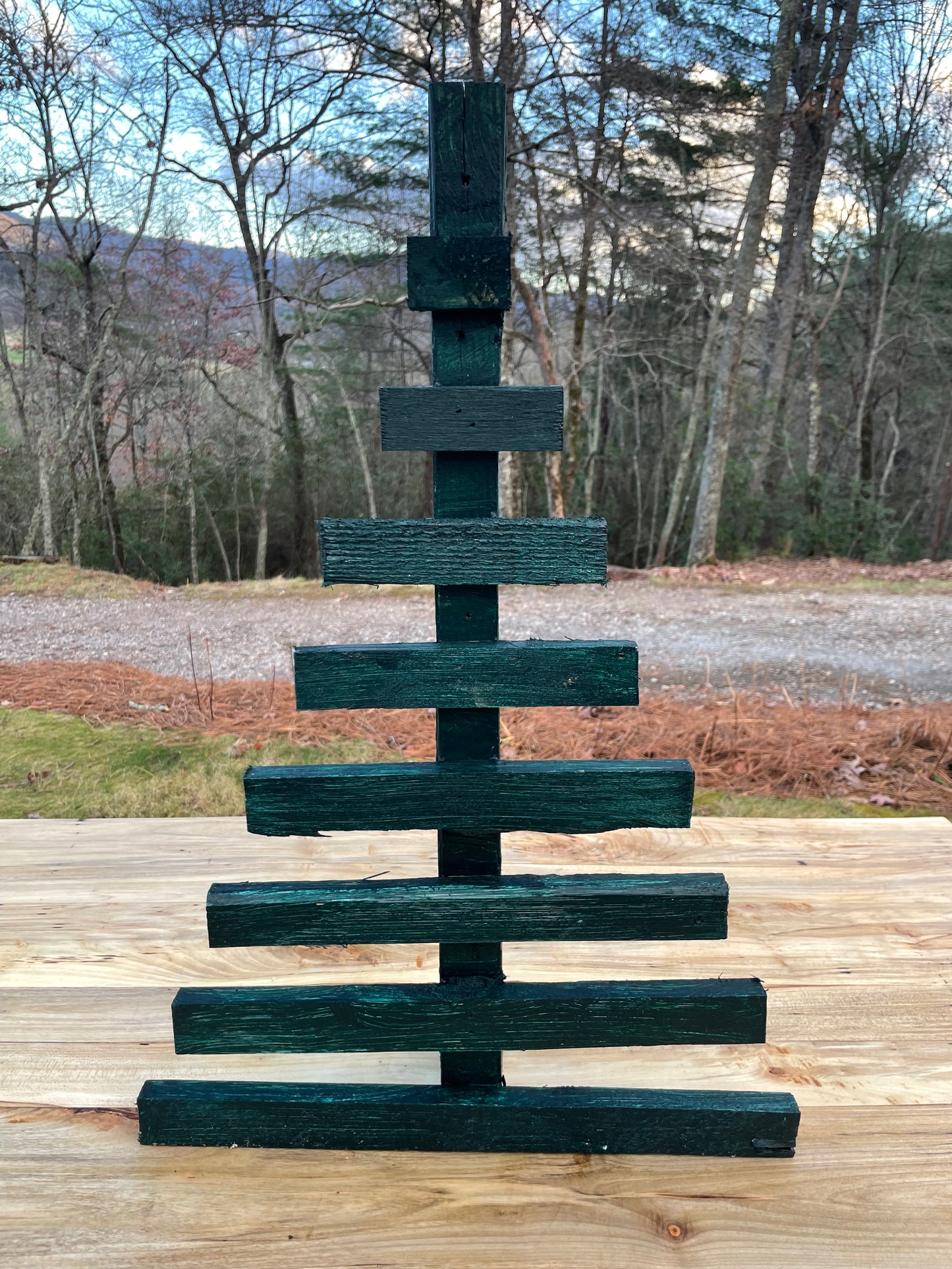 Christmas is just around the corner! Looking for a small Christmas tree that is easy to maintain or will just bring a little extra decoration to your festive home? Need a last minute gift for a friend? Check out these wooden Christmas trees made from reclaimed pallet wood, and pick a color that would accent your home!