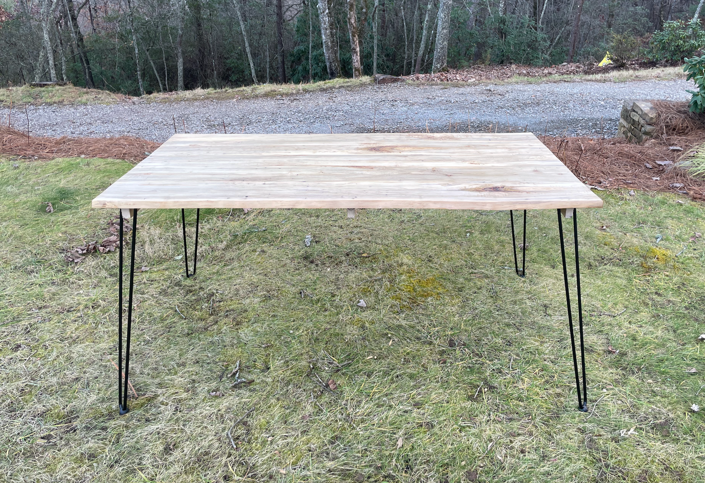 Looking to add modern rustic flair to your eating area? Check out our dining table with a handcrafted maple top and hairpin legs. This table is great for seating 6 or more guests for a meal, games or fellowship, and the wooden top is food-safe and smooth to the touch!